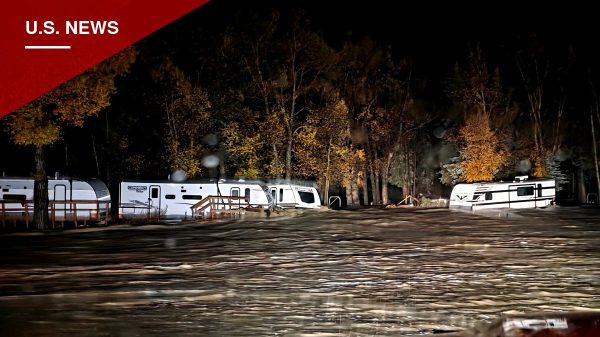 Historic Flooding Strands Families on Rooftops Across San Juan County